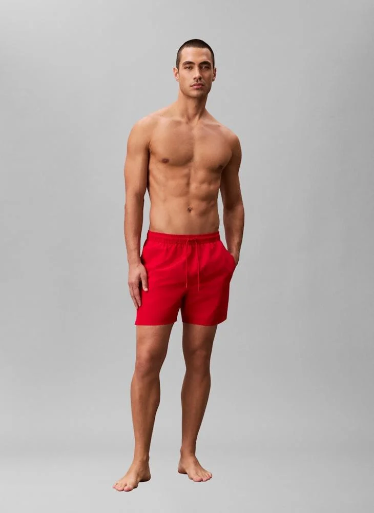CALVIN KLEIN  Solid Swim Shorts for Men | Best Price UAE
